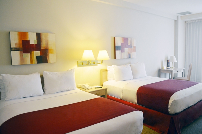 Imagen de la habitación del Hotel San Marcos Grand. Foto 11