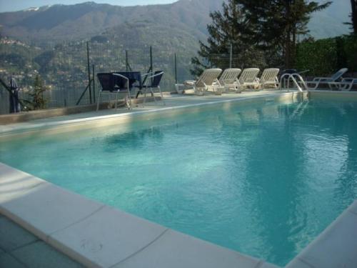 Imagen de la piscina del Hotel San Marino, Laglio. Foto 7