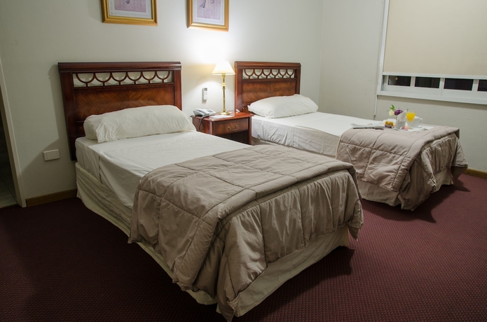 Imagen de la habitación del Hotel San Nicolas Plaza. Foto 2