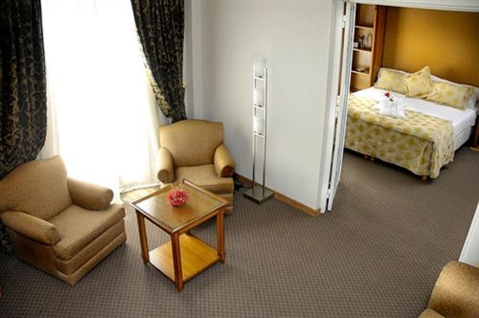 Imagen de la habitación del Hotel San Nicolas Plaza. Foto 8