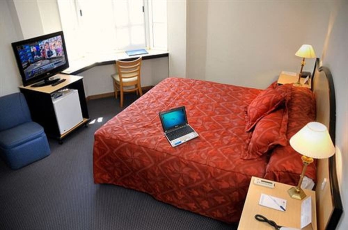 Imagen de la habitación del Hotel San Nicolas Plaza. Foto 9