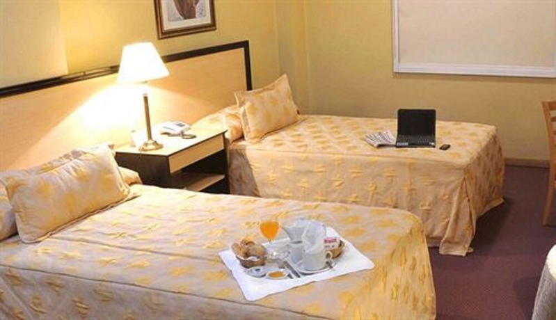 Imagen de la habitación del Hotel San Nicolas Plaza. Foto 10