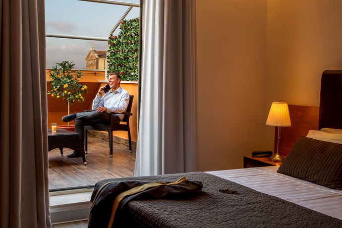 Imagen de la habitación del Hotel San Paolo Roma. Foto 2