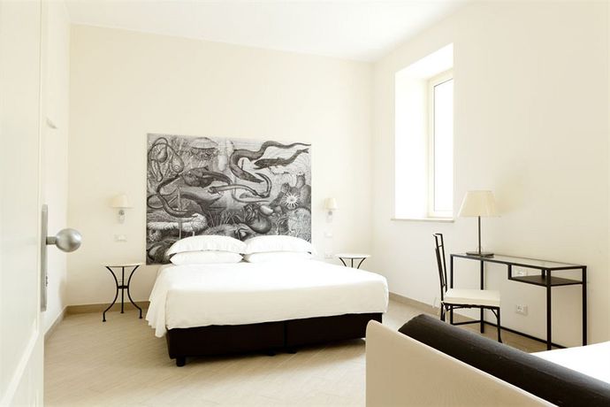 Imagen de la habitación del Hotel San Pietro Palace. Foto 9