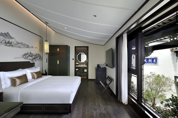 Imagen de la habitación del Hotel San Po Hotel. Foto 8