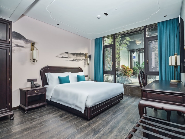 Imagen de la habitación del Hotel San Po Hotel. Foto 10