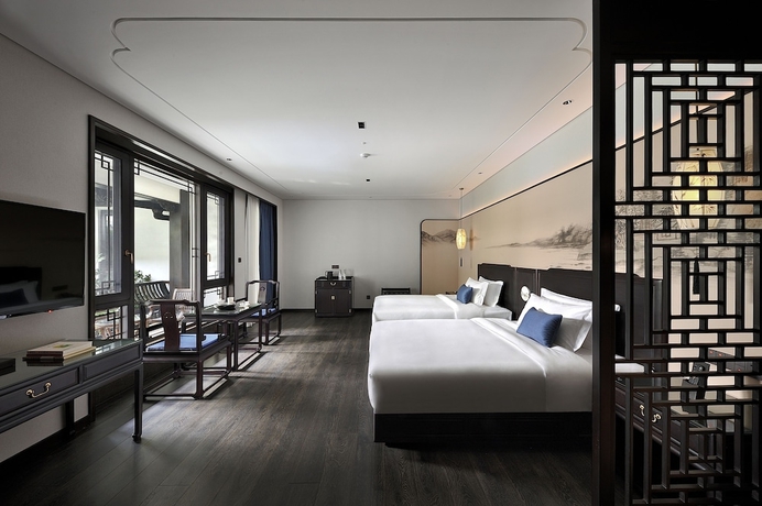 Imagen de la habitación del Hotel San Po Hotel. Foto 13