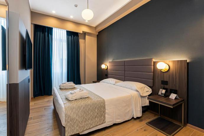 Imagen de la habitación del Hotel San Remo, Roma. Foto 12