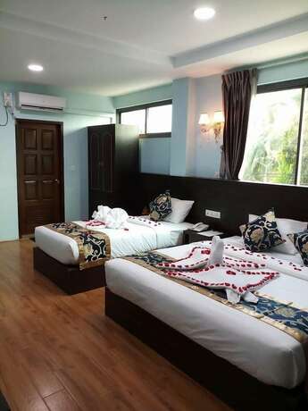 Imagen de la habitación del Hotel San Taw Win. Foto 16