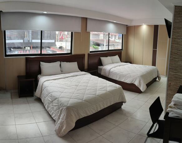Imagen de la habitación del Hotel San Thomas Inn. Foto 5