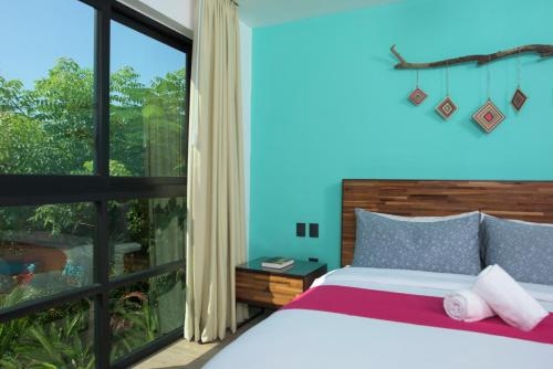 Imagen de la habitación del Hotel San Tr&oacute;pico Boutique and Peaceful Escape. Foto 7