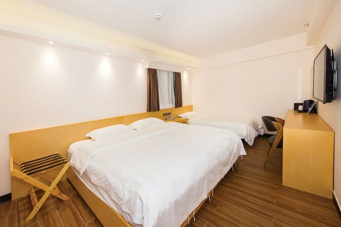 Imagen de la habitación del Hotel San Tung Fong Commercial Inn South Wing. Foto 18