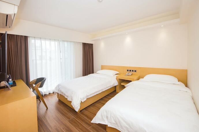 Imagen de la habitación del Hotel San Tung Fong Commercial Inn South Wing. Foto 19