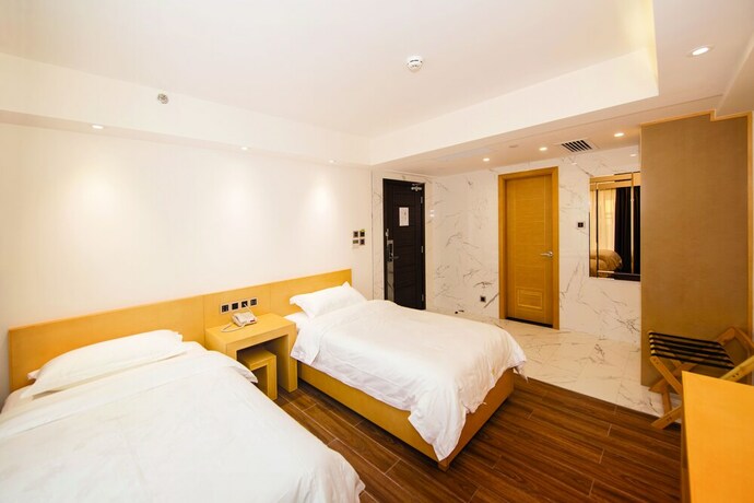 Imagen de la habitación del Hotel San Tung Fong Commercial Inn South Wing. Foto 23
