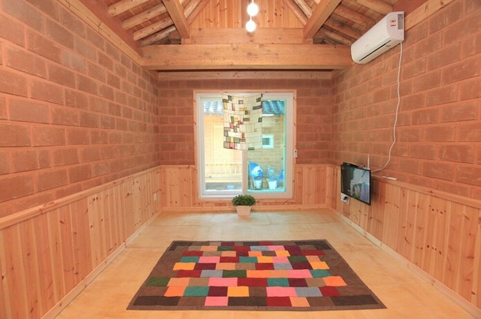 Imagen de la habitación del Hotel Sanasa Red Clay House. Foto 9