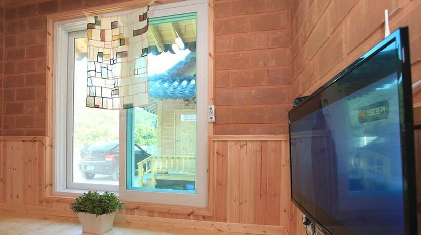 Imagen de la habitación del Hotel Sanasa Red Clay House. Foto 12