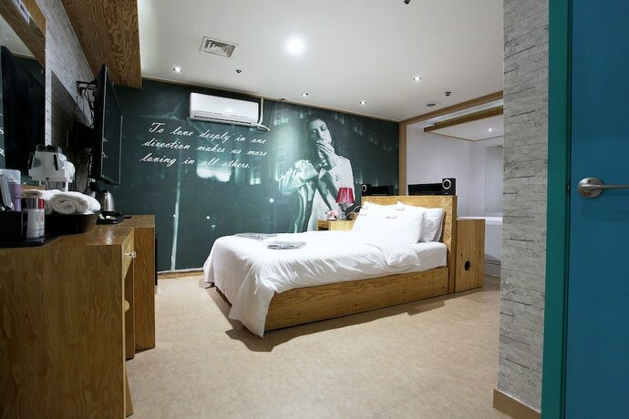 Imagen de la habitación del Hotel Sanbon CC. Foto 15