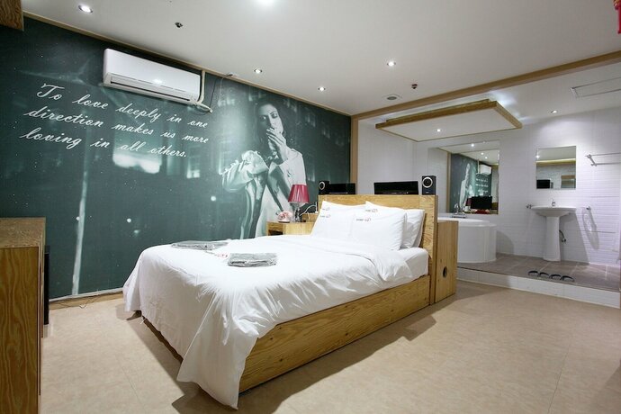 Imagen de la habitación del Hotel Sanbon CC. Foto 16