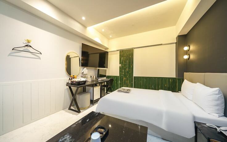 Imagen de la habitación del Hotel Sanbon CF. Foto 13