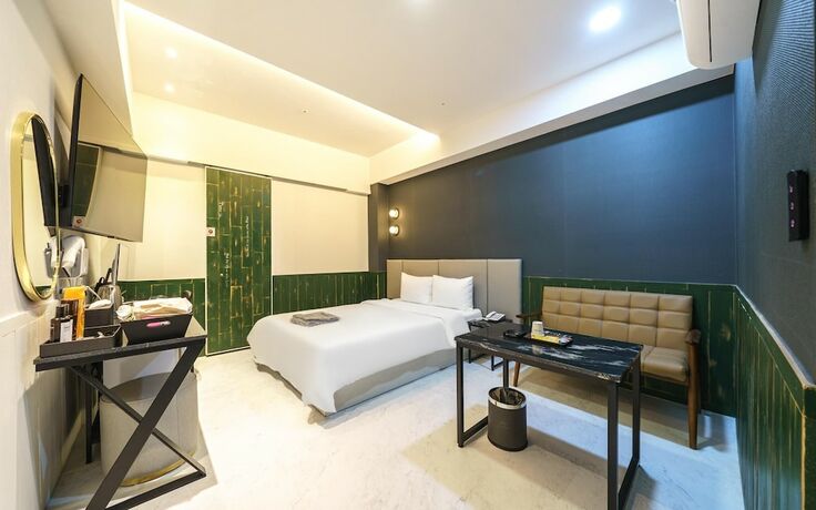 Imagen de la habitación del Hotel Sanbon CF. Foto 14