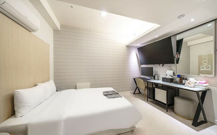 Imagen de la habitación del Hotel Sanbon CF. Foto 17