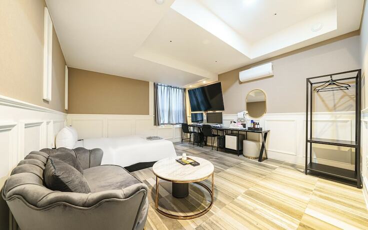 Imagen de la habitación del Hotel Sanbon CF. Foto 18