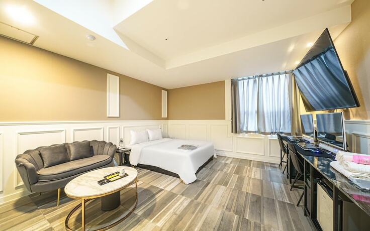 Imagen de la habitación del Hotel Sanbon CF. Foto 19