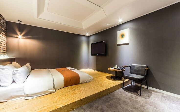 Imagen de la habitación del Hotel Sanbon in Cafe. Foto 11