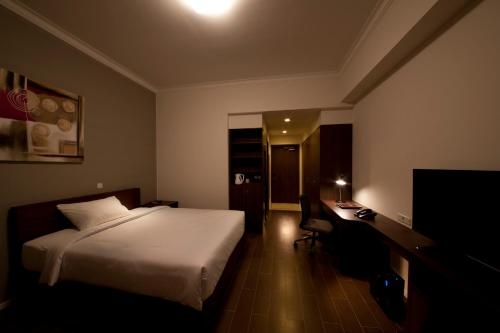 Imagen de la habitación del Hotel Sancrest Residence Deltamas. Foto 7