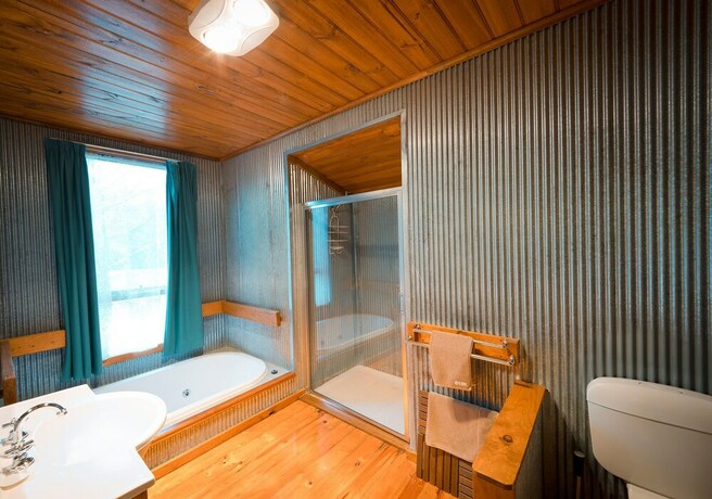 Imagen de la habitación del Hotel Sanctuary Park Cottages. Foto 26