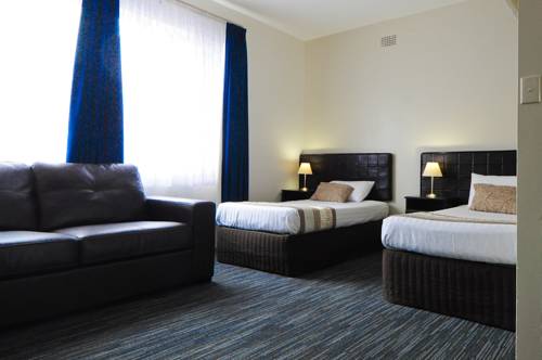 Imagen de la habitación del Hotel Sanctuary Resort Motor Inn. Foto 2