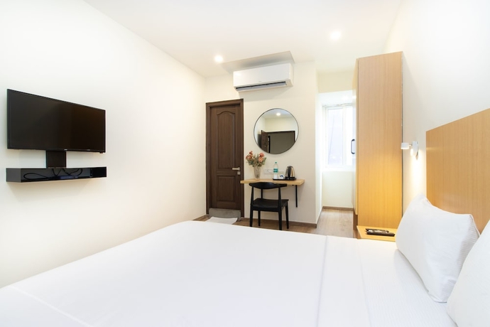 Imagen de la habitación del Hotel Sanctum Suites Richmond Road Bangalore. Foto 9