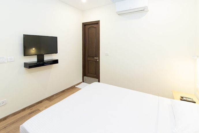 Imagen de la habitación del Hotel Sanctum Suites Richmond Road Bangalore. Foto 10