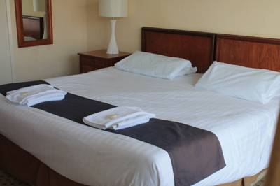 Imagen de la habitación del Hotel Sand Bay Holiday Village. Foto 3