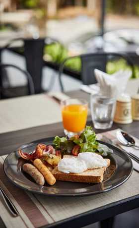 Imagen del bar/restaurante del Hotel Sand Dollar Boutique. Foto 3