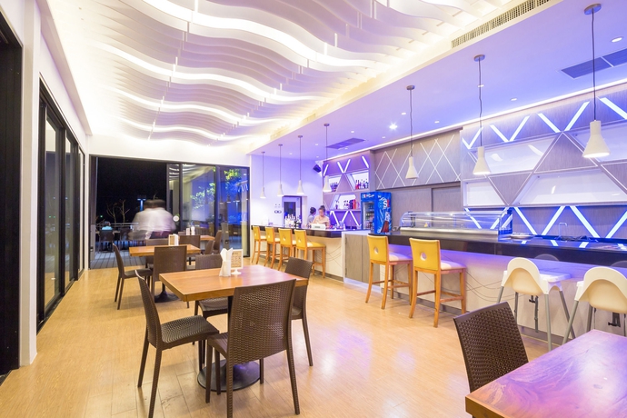 Imagen del bar/restaurante del Hotel Sand Dunes Chaolao Beach Resort. Foto 5