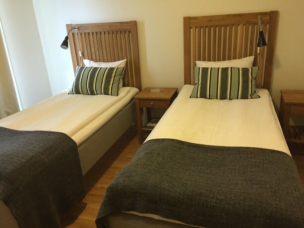 Imagen de la habitación del Hotel Sand Golf Club. Foto 18