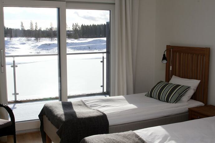 Imagen de la habitación del Hotel Sand Golf Club. Foto 19