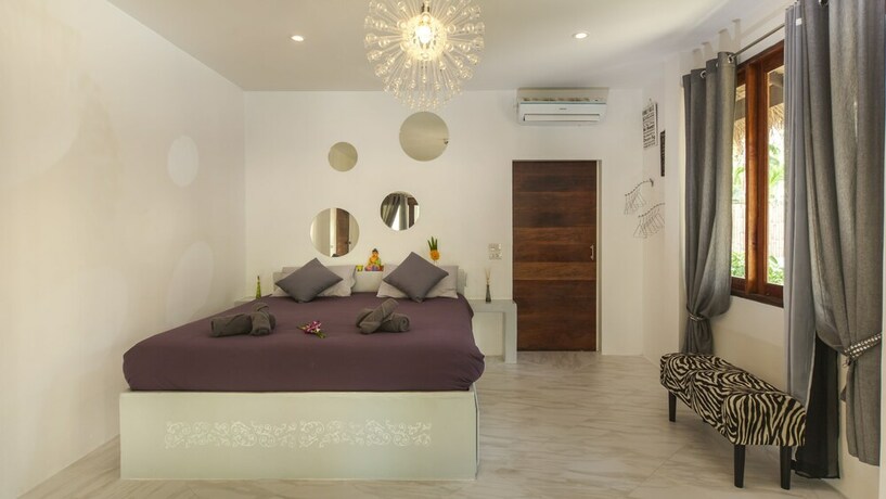 Imagen de la habitación del Hotel Sand Shine Villa. Foto 19