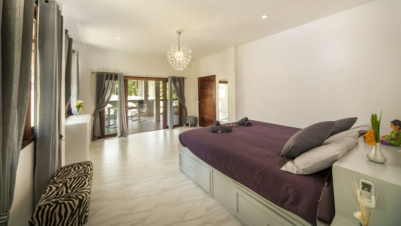 Imagen de la habitación del Hotel Sand Shine Villa. Foto 21