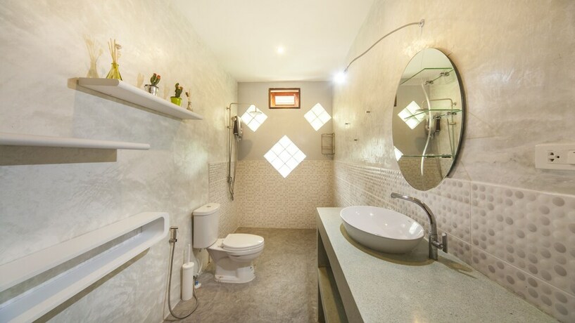 Imagen de la habitación del Hotel Sand Shine Villa. Foto 22