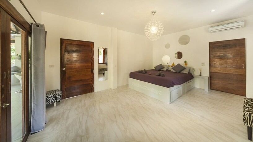 Imagen de la habitación del Hotel Sand Shine Villa. Foto 25