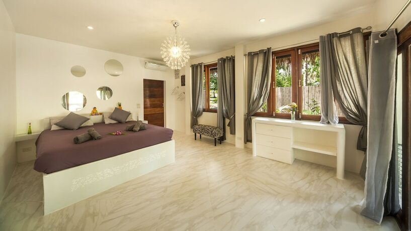 Imagen de la habitación del Hotel Sand Shine Villa. Foto 26