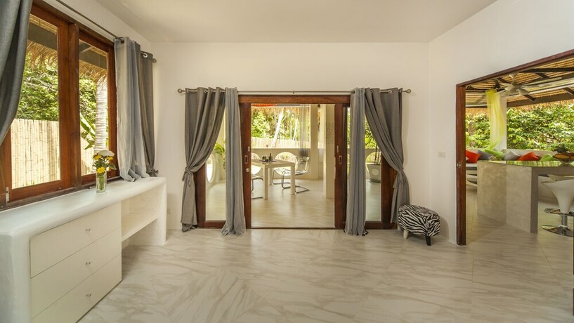 Imagen de la habitación del Hotel Sand Shine Villa. Foto 27