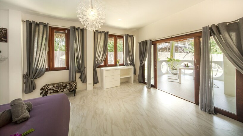 Imagen de la habitación del Hotel Sand Shine Villa. Foto 28
