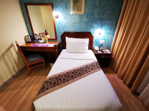 Imagen de la habitación del Hotel Sandakan. Foto 7