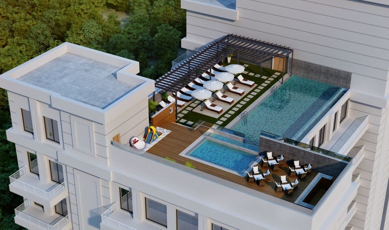 Imagen de la piscina del Hotel Sandal Suites Op. By Lemon Tree Hotels. Foto 19