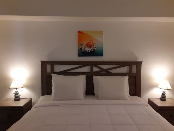 Imagen de la habitación del Hotel Sandalwood Beach Resort. Foto 4
