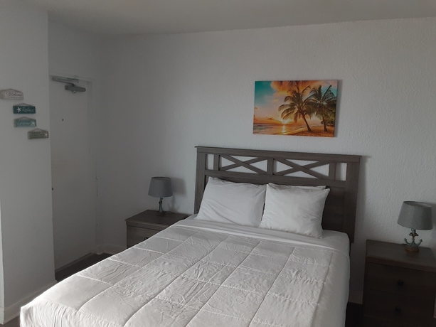 Imagen de la habitación del Hotel Sandalwood Beach Resort. Foto 10