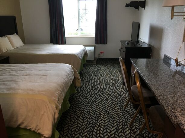 Imagen de la habitación del Hotel Sandalwood Studios And Suites. Foto 9